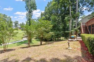 View from the basement of the back yard and 9th fairway